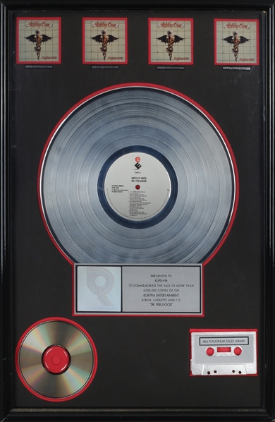 Motley Crue 1989 Dr. Feelgood RIAA Multi Platinum Award Issued To KUPD-FM