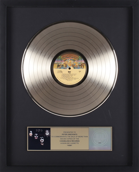 KISS 1974 Debut Album RIAA Gold Record Award Presented to Peter ‘Moose’ Oreckinto With COA